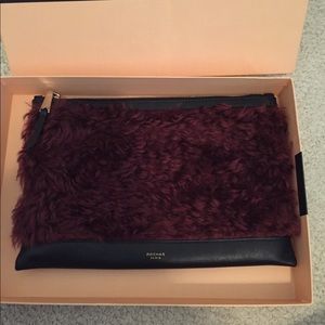 Rochas faux fur clutch New with box wine/black